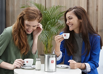 girls drinking coffee at a cafe